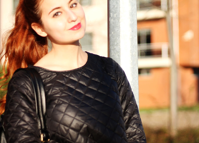 quilted sweatshirt detail and red haired blogger