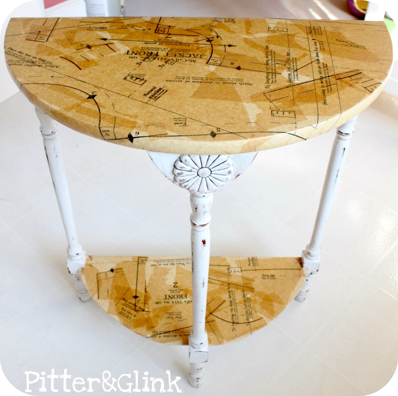 Sewing pattern side table. Mod Podge Rocks