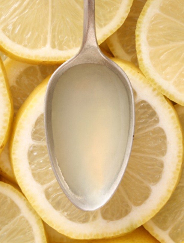 Lemon juice helps naturally remove stains and gradually whiten your nails