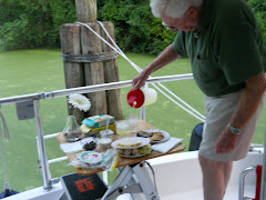 Cinner at South Mills Lock.  We're tied to that post (dolphin)  and another on the bow of the boat.