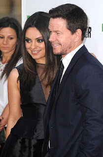 Mila Kunis and Mark Walhlberg on the red carpet at the premiere of their new movie Ted