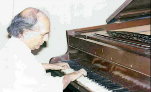SHANKER of Shankar-Jaikishen duo on his piano