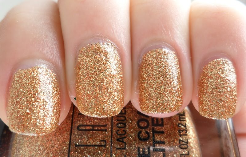 The Times New Roman Nail Polish of the Moment Gold Glitz by Milani