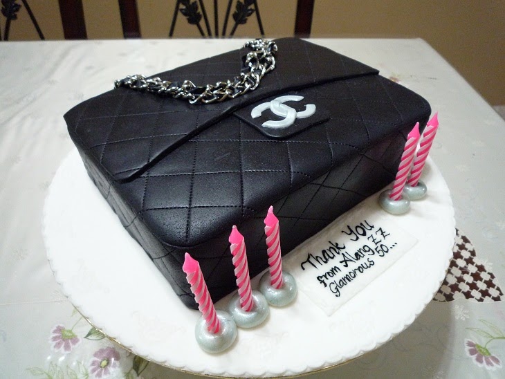Chanel handbag themed birthday cake with fondant accessories