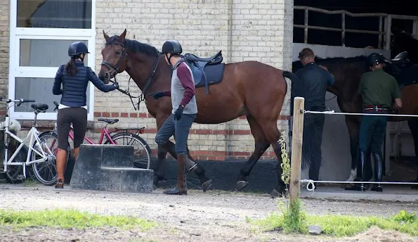 Crown Princess Mary and Crown Prince Frederik of Denmark at Gråsten Palace on horseback