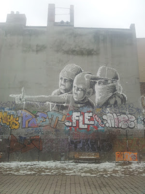 Street art work A game of gangs near Schlesisches Tor Kreuzberg Berlin