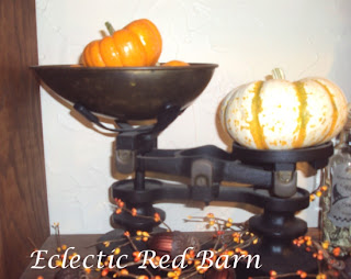 vintage scale with pumpkins and acorns and fall berries