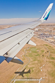 Airplane window seat photography by Chris Gardiner www.cgardiner.ca who tends to fly westjet a lot