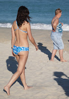 Rumer Willis wearing bikini on a sandy Miami beach
