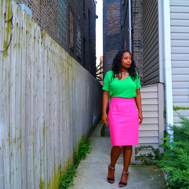 pink pencil skirt worn with a green tee