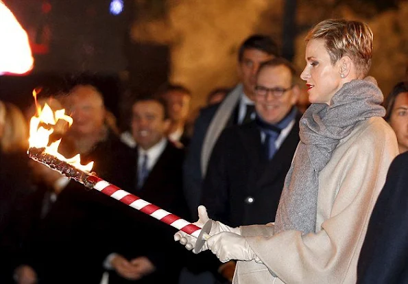 Princess Charlene of Monaco and Prince Albert II of Monaco attend the Sainte-Devote ceremony