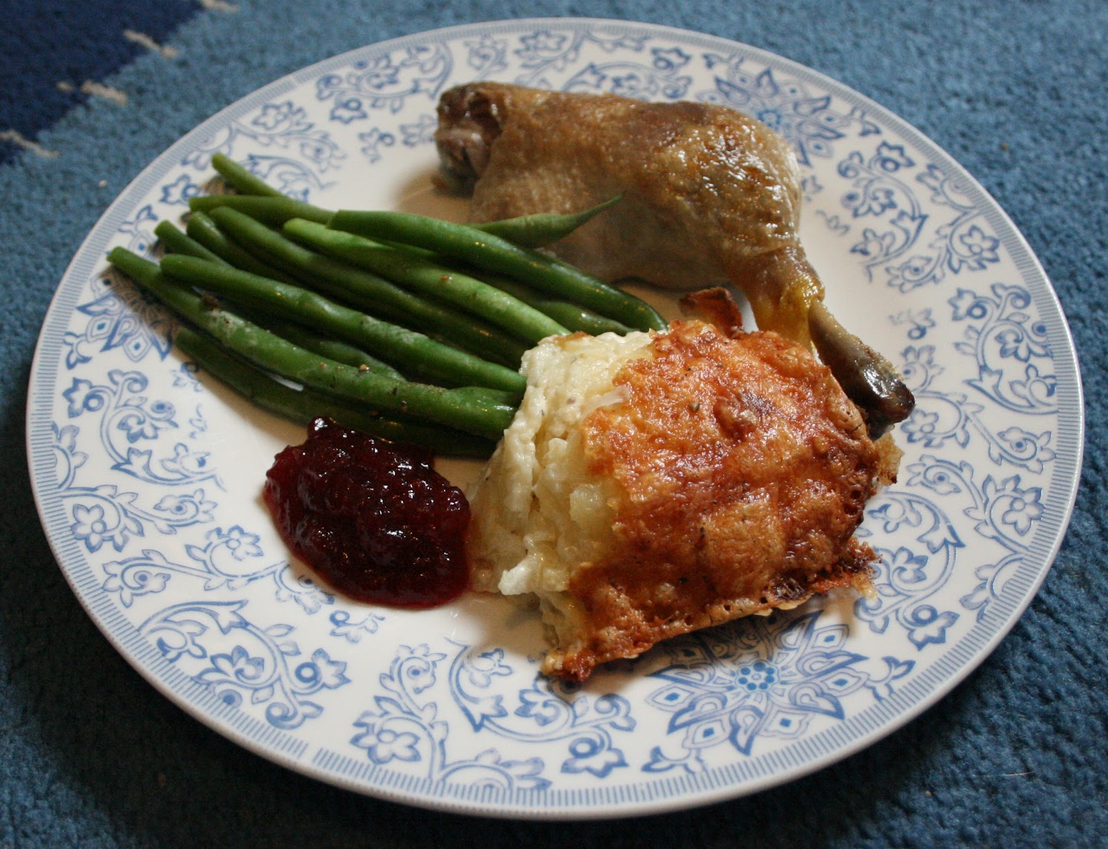 A Pinch Of Passion Confit duck legs with dauphinoise potatoes