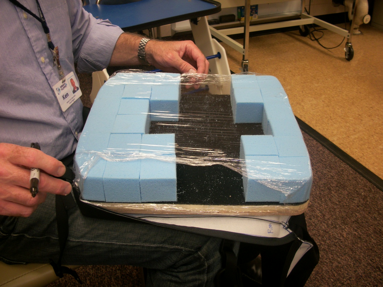 Fitting a Grid Wheelchair Back for a Child with Kyphotic Back