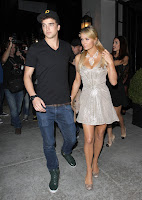 Paris Hilton holding hands with River Viiperi