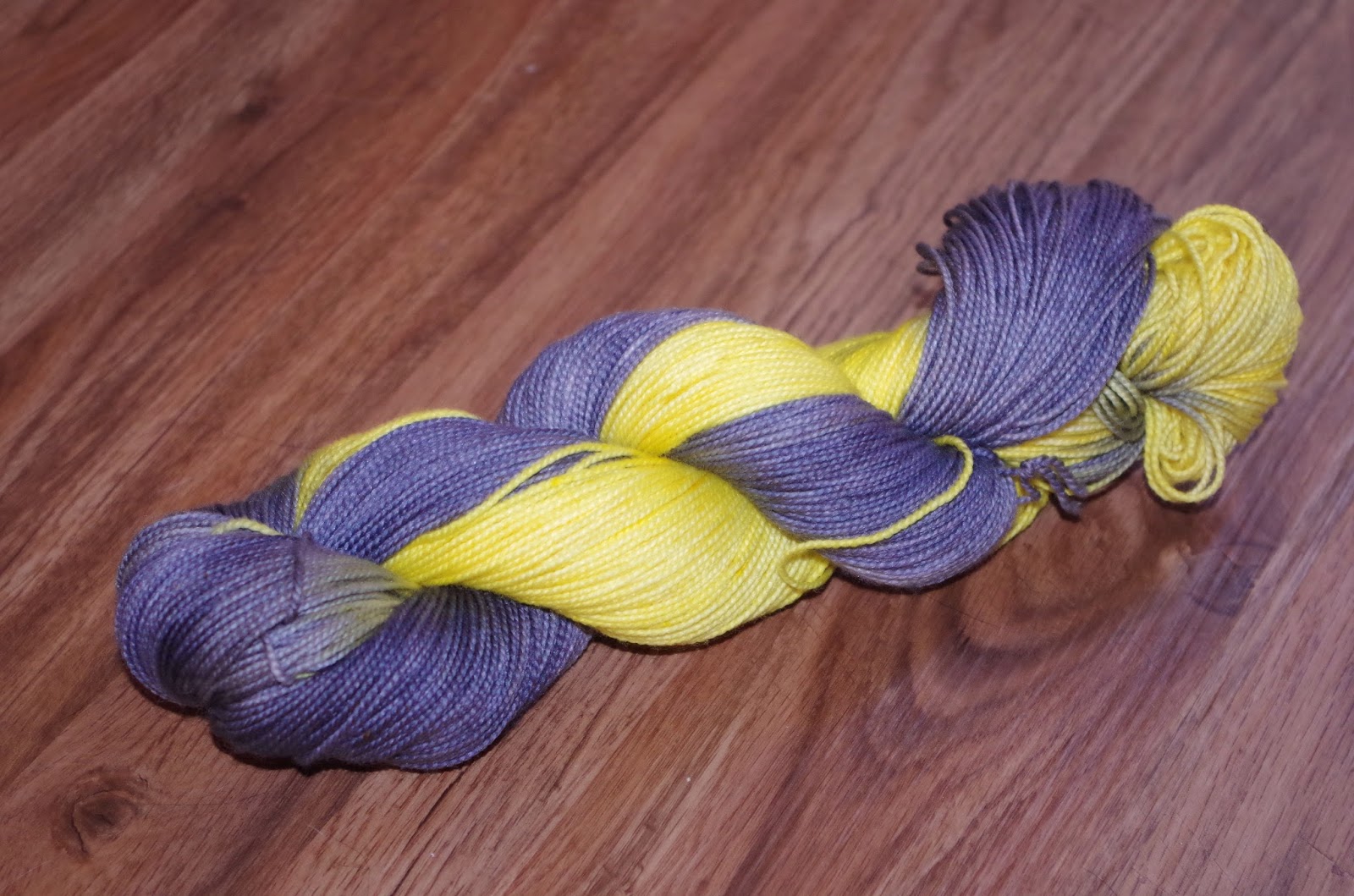 More Than Mom Yellow and Gray Hand Dyed Superwash Merino Yarn and Coat of Arms