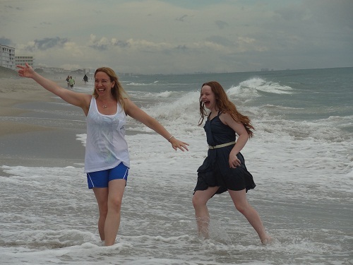 Girls playing beach Melbourne Florida surf
