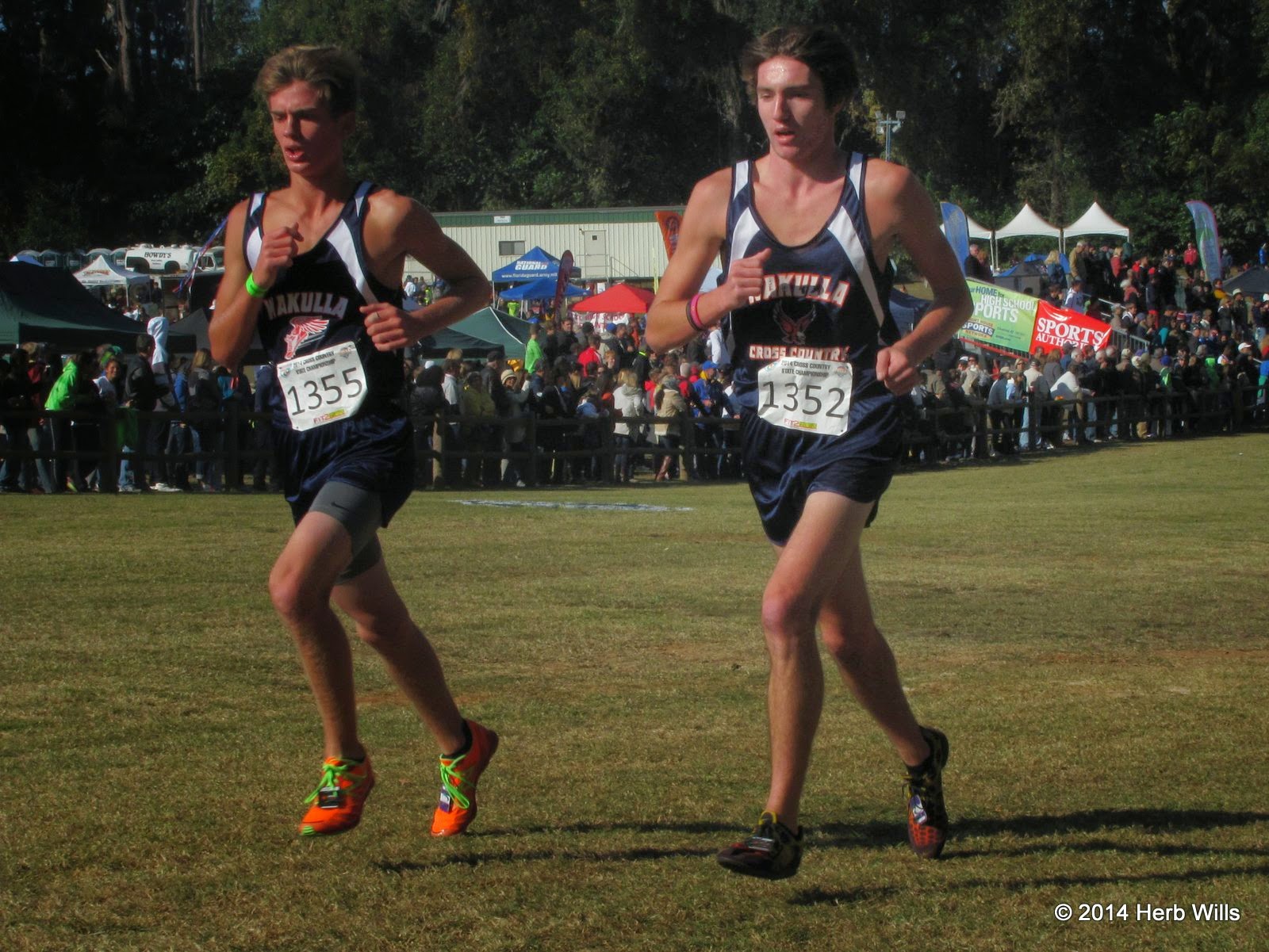 Wakulla High athletes #1355 Caleb Wiedeman (157th, 18:39.8) and #1352 Alan Pearson (163rd, 18:51.0) with two kilometers to go in the class 2A boys 5K Caleb Wiedeman and Alan Pearson