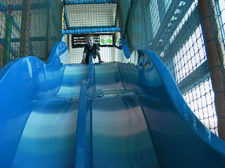 double bouncy slide in soft play facility