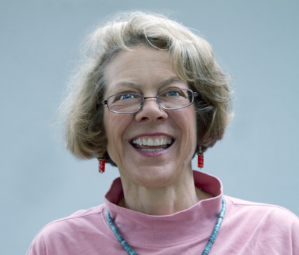 a smiling photo of author Nancy Wood