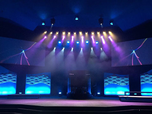 AV systems integrator Whiteley Solutions relied on Guitar Center Professional to execute a lengthy and varied equipment list for a Nebraska church that needed to renovate two auditorium spaces over a strict timeline. Bellvue Christian Center photo of stage #1