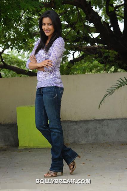 Priya Anand in blue jeans and Blue top in different poses - Priya Anand photoshoot pics