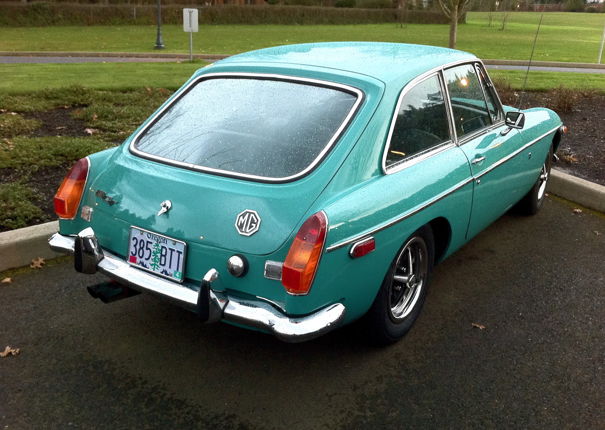 OLD PARKED CARS. 1970 MG GT coupe.