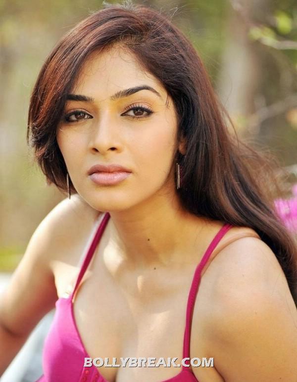Rithika posing in a red spaghetti strap tank top.  -  Rithika latest pics