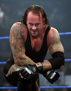 ثمانية مصارعين يستحقون مواجهة أندرتيكر في ريسلمانيا  Undertaker+wwe