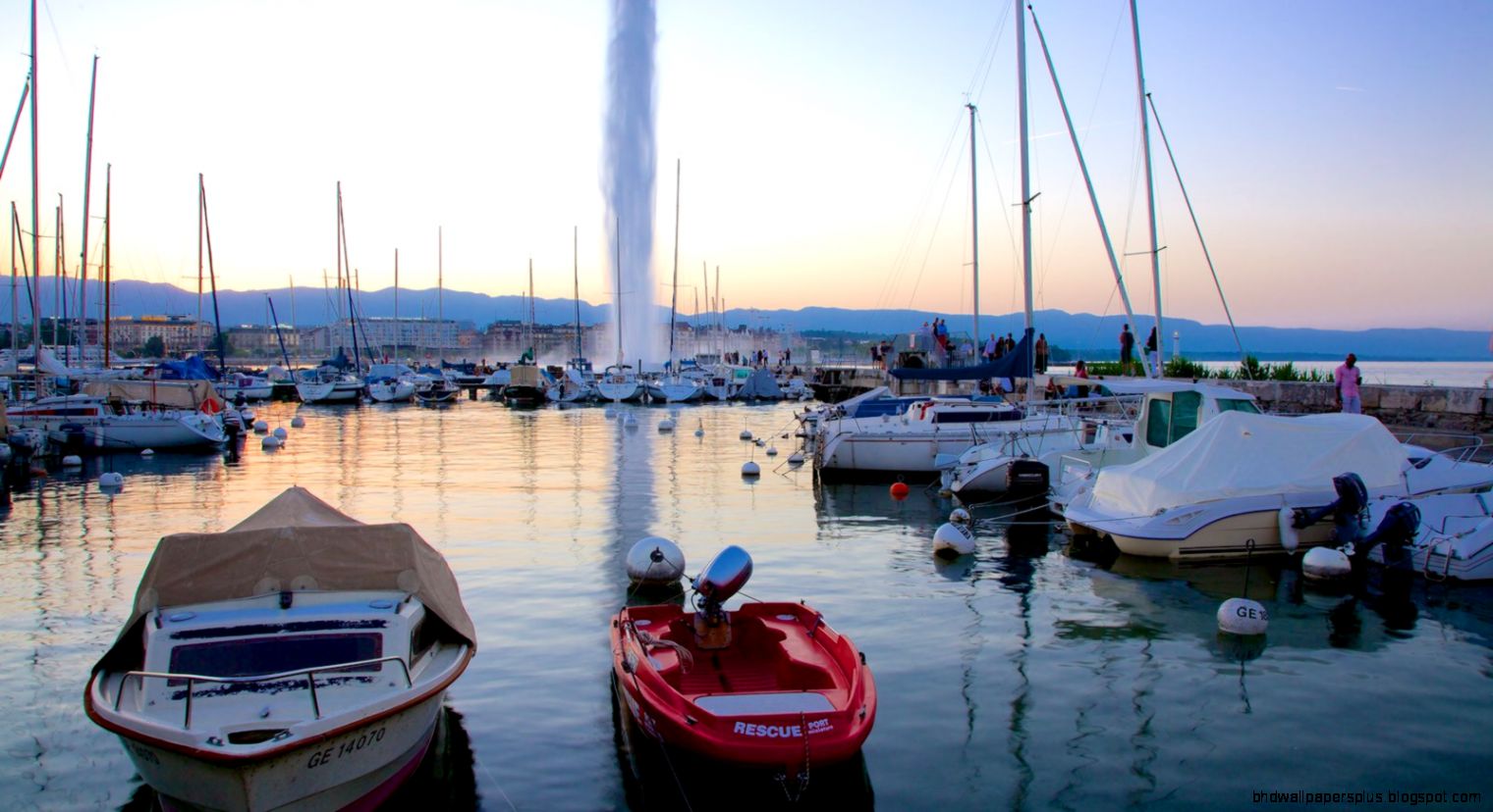 Jet dEau Fountain showing a coastal town a marina and a fountain Jet dEau Fountain showing a coastal town a marina and a fountain