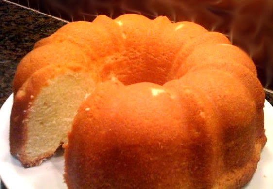 Lemon Sour Cream Pound Cake: Classic pound cake flavoured with lemon and sour cream baked in a bundt pan (ring mould) to symbolize unending luck for the New Year.