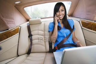 Women Executive with Car Laptop Mobile WOMEN ; SHARE YOUR SUCCESS STORY WITH US