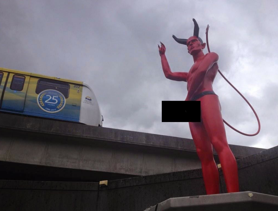 Naked, erect Satan statue, with devilish details, put up 