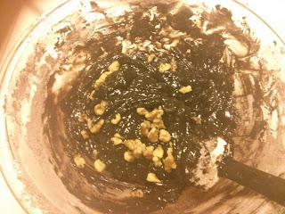 adding in walnuts and chocolate chips