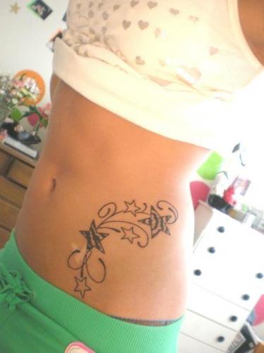 star tattoos lower stomach