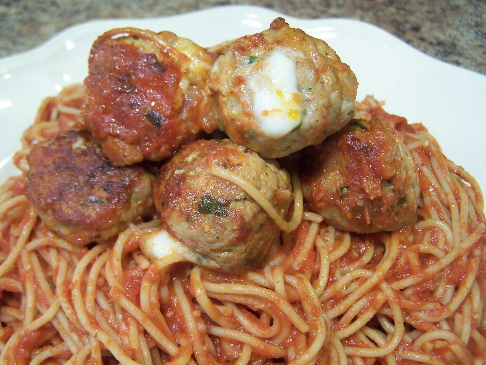 The Peppered Pantry Sausage Stuffed Meatballs