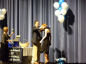 She is receiving her IB stole.