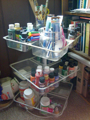 Organize craft paint on a cabinet door