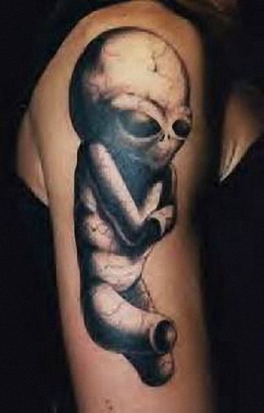 tribal alien tattoo 