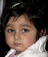A baby wearing hairclip
