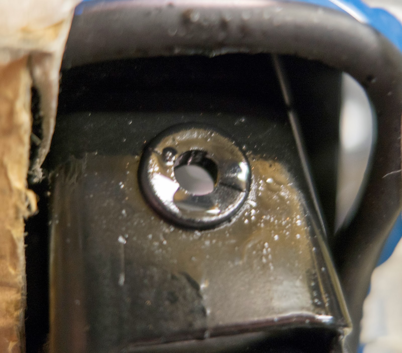 I also sprayed a little in the hole before placing the grommet in position. I think sprayed a little more in the inside of the grommet to aid threading the cables through. I also sprayed a little in the hole before placing the grommet in position. I think sprayed a little more in the inside of the grommet to aid threading the cables through.