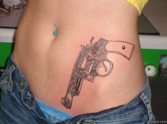 AMET LIWAT: Gun Tattoos on Hips