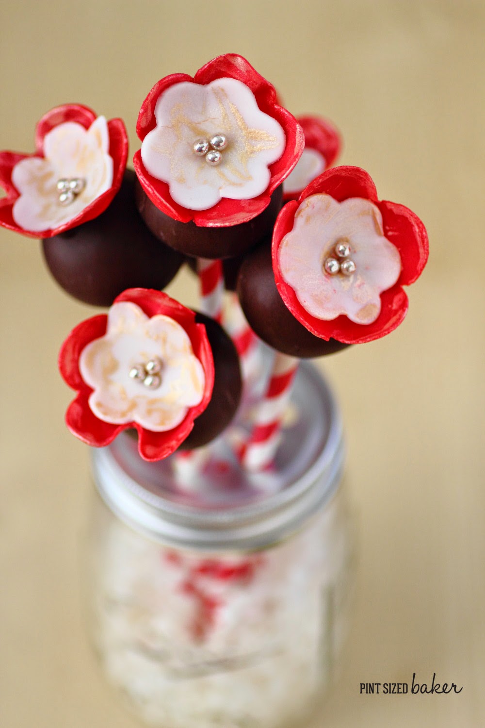 This bouquet of pretty fondant flowered cake pops would be a great gift for my someone special.