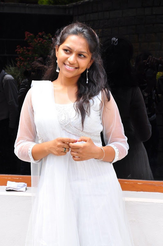 Sri  New Telugu Heroine PicsPhotos white dress gallery pictures