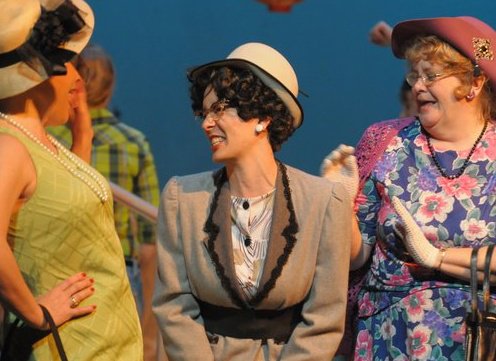 Heather May as Irma Kronkite (middle)