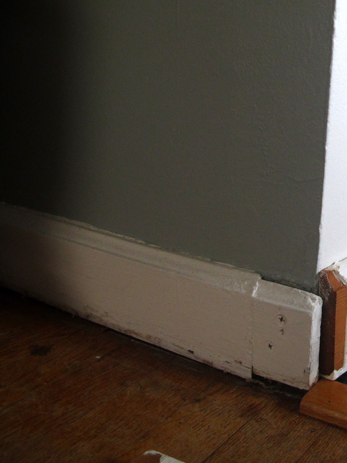 Just a girl with a hammer Baseboard. Finally.