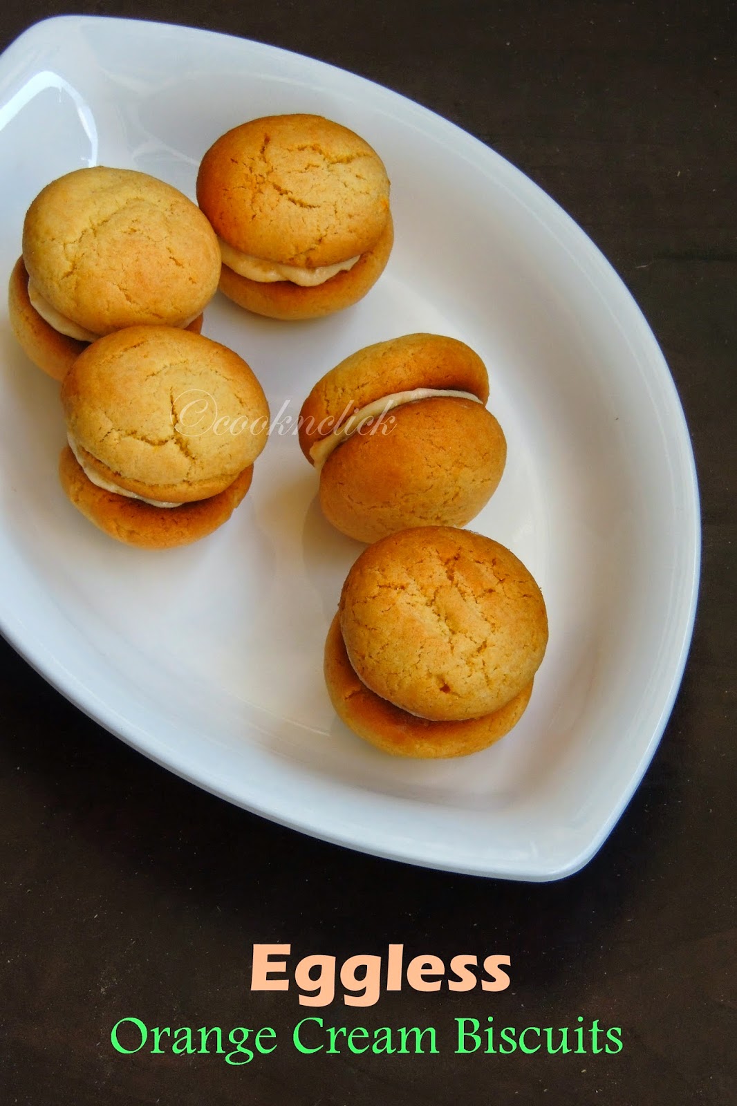 Eggless Orange Cream Biscuits Cook N Click