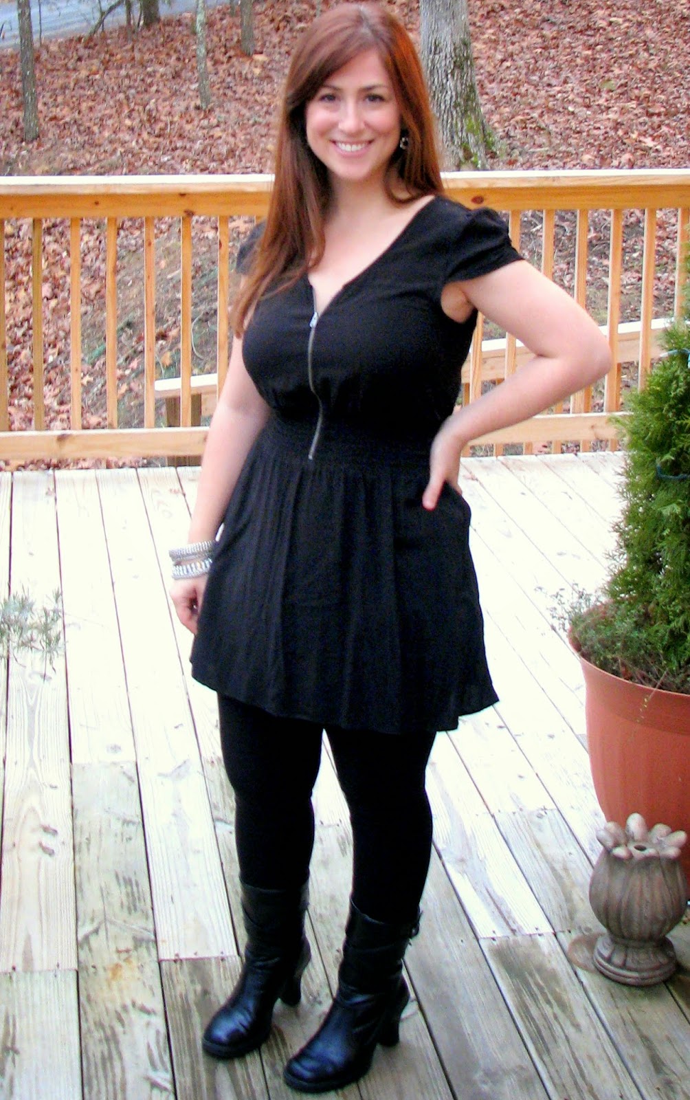 black dress with sweater over it
