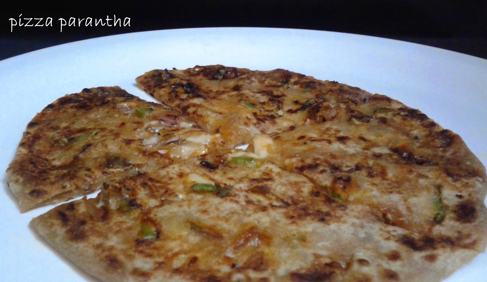 http://www.paakvidhi.com/2015/02/pizza-parantha-mashroomonioncapsicum.html