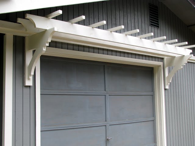 blue roof cabin: DIY Trellis Over the Garage Door