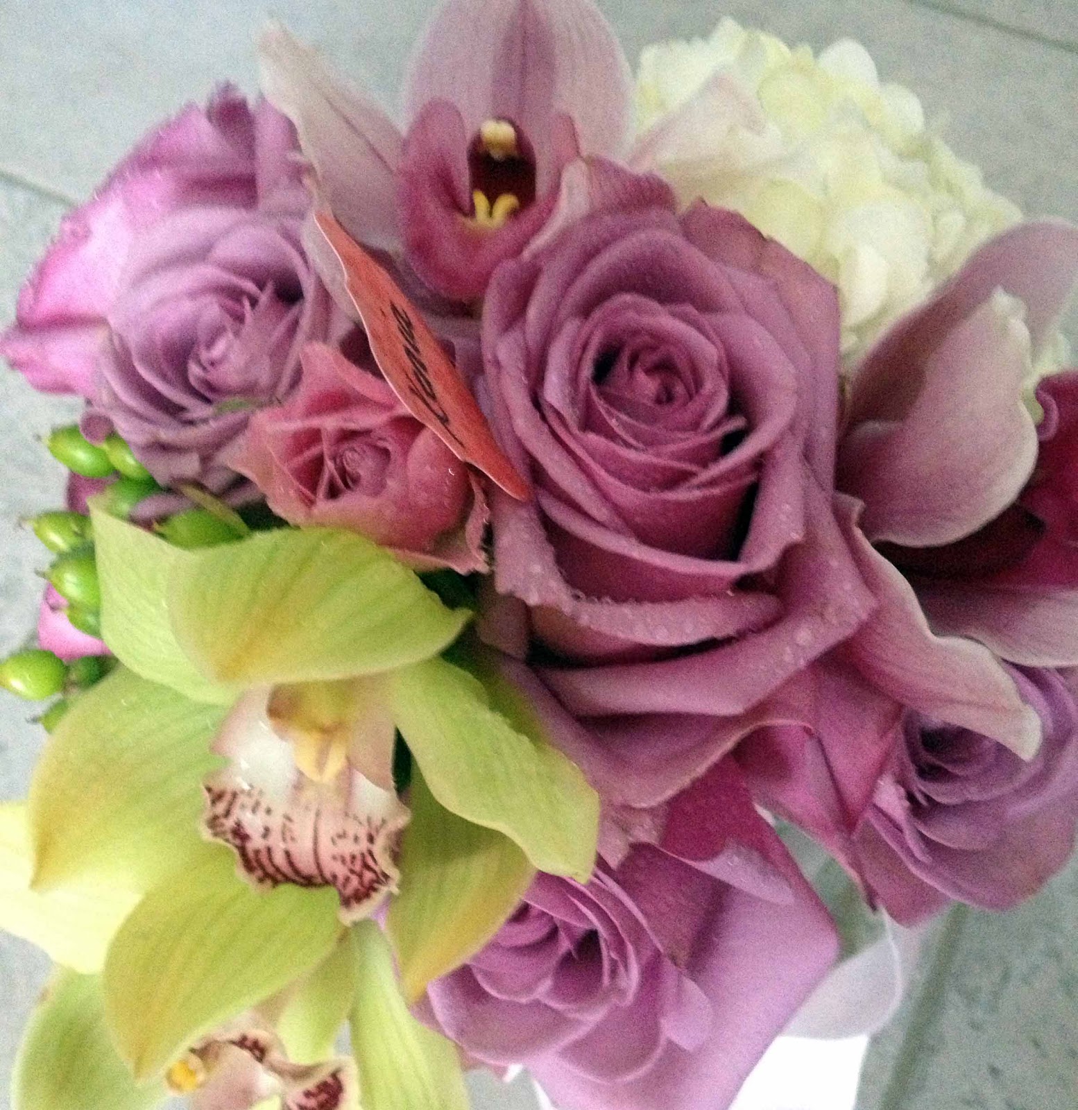 Celebrate Beautifully Xenia and Derek's Wedding Flowers (Purple and Green)